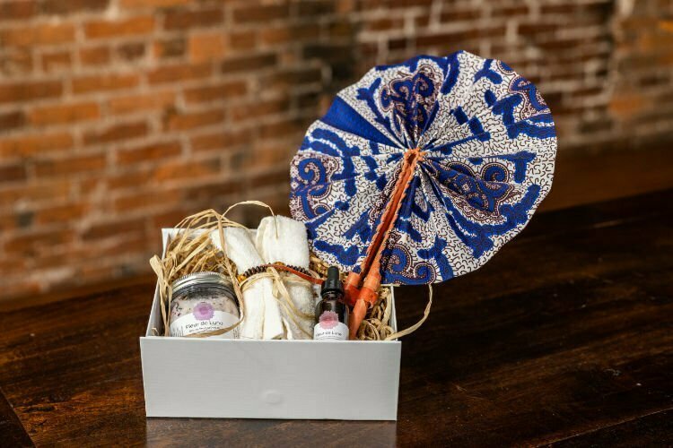 SUN & OCEAN gift box with Wild flower bath salts, Organic lavender & Calendulis infused massage oil, Square Towel, African bracelet, Fan